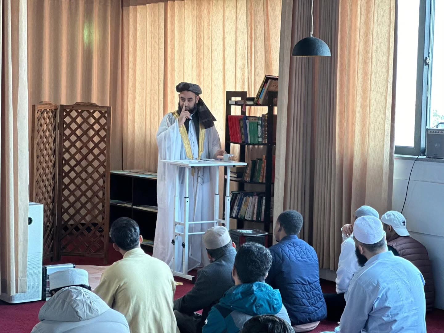 Imam delivering the Friday khutbah at Jeju Central Masjid
